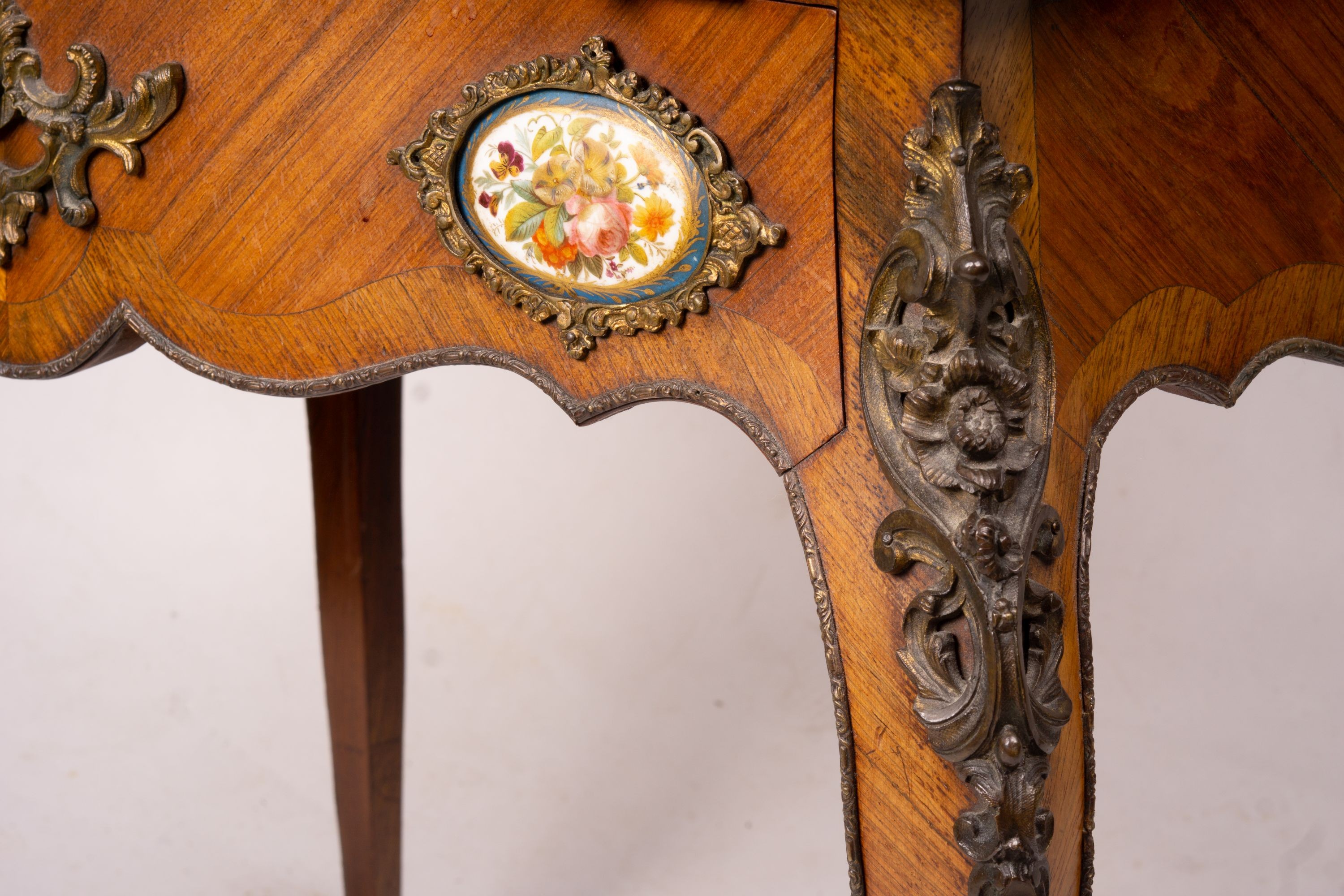 A late 19th century French gilt metal and porcelain mounted kingwood bonheur du jour, width 73cm, depth 50cm, height 128cm